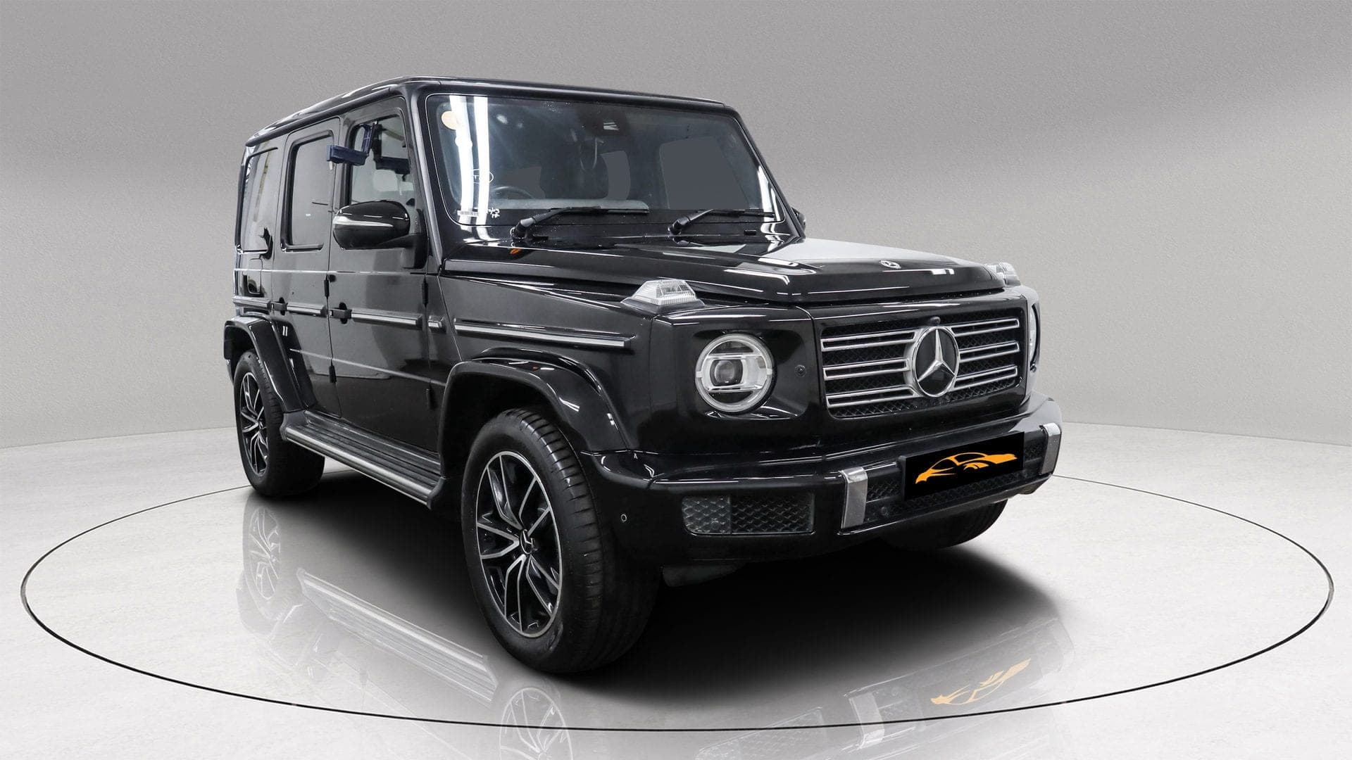 Mercedes-Benz G400d AMG Line Premium Plus in black, front three-quarter view on black alloy wheels