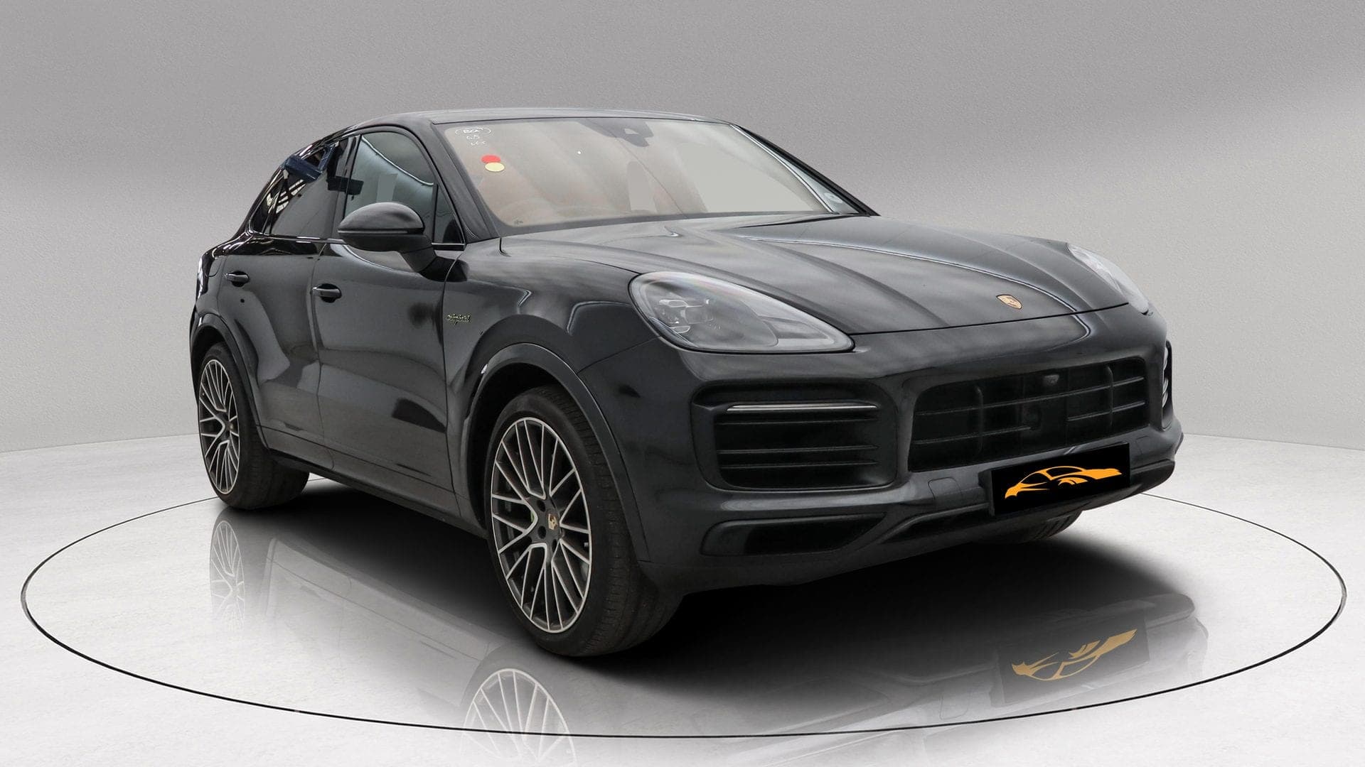 Porsche Cayenne Coupe E-Hybrid Platinum Edition in black — front three-quarter view