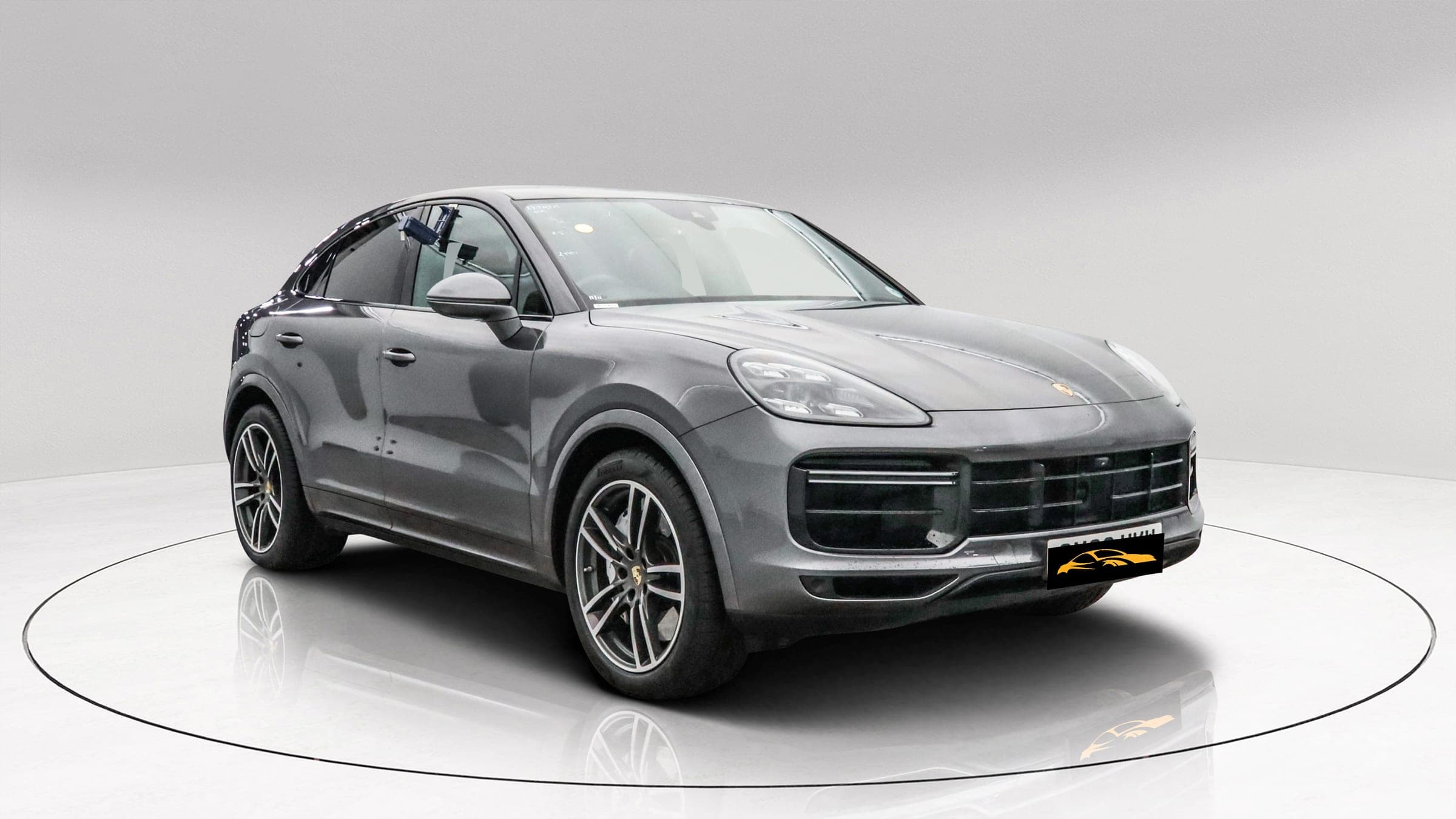 Porsche Cayenne Coupe Turbo in grey, front three-quarter view